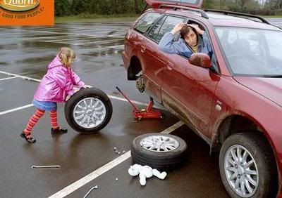 little_girl_changes_tire.jpg