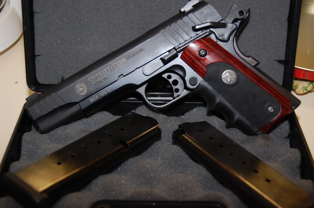 IMAGE: http://i128.photobucket.com/albums/p193/M715/Guns/DSC_0053.jpg